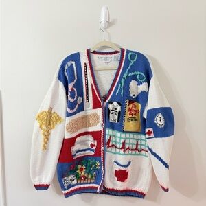 THE EAGLES EYE 1994 Nurse Teddy Bear Hand Knit Cardigan Womens M Novelty RARE